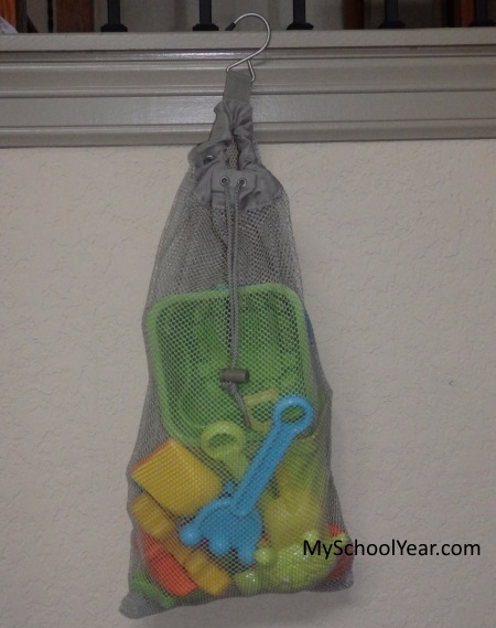 Use a mesh bag for sand toys